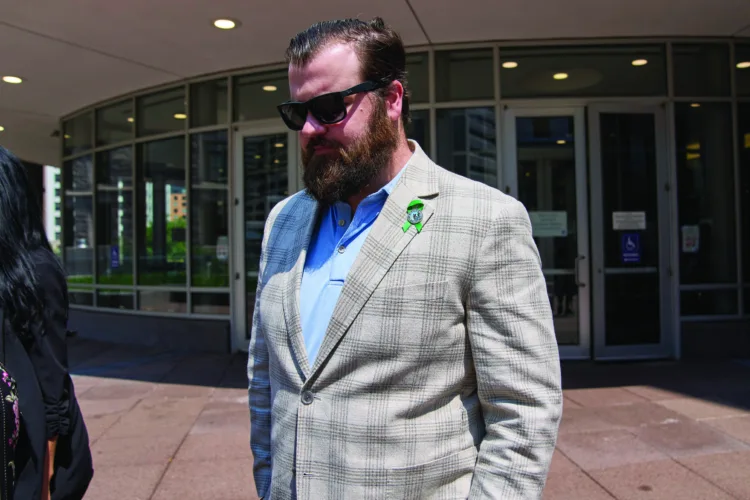 Man who killed top Minnesota lawmaker and her husband makes first state court appearance